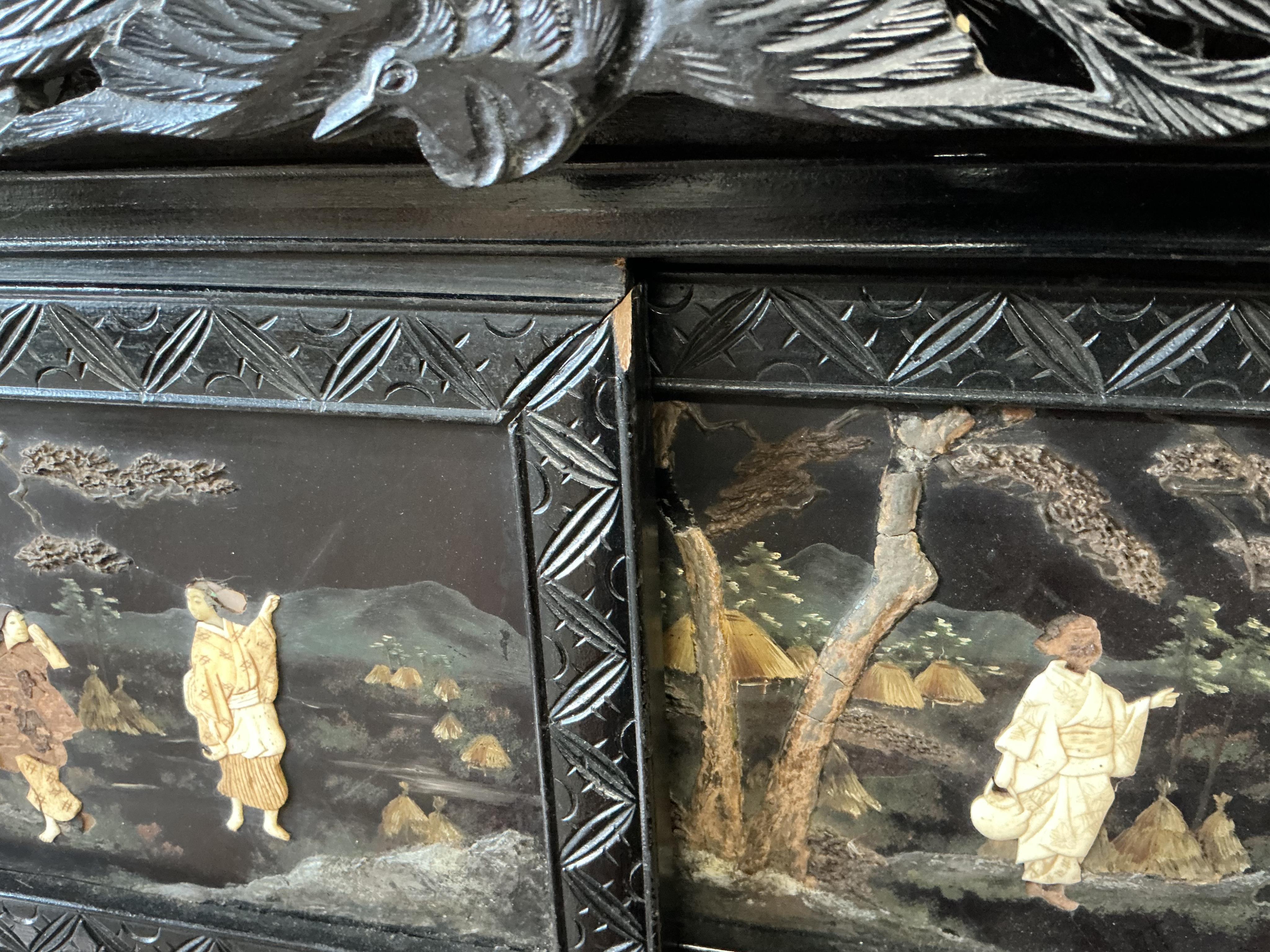 A Japanese Meiji period ebonised cabinet, width 110cm, depth 32cm, height 150cm CITES Submission reference Q4A31H9Q